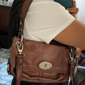 Vintage leather purse with a key